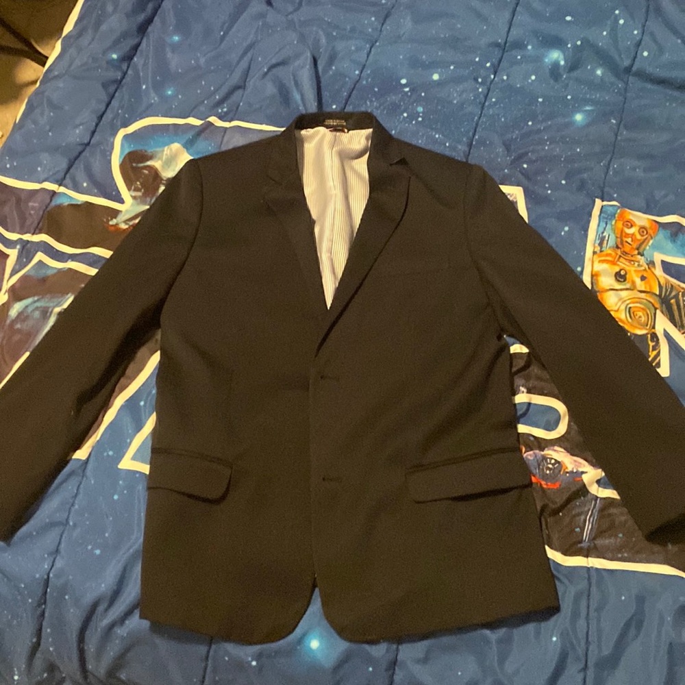 This is a Tommy Hilfiger size 18 and it is the color black on the outside